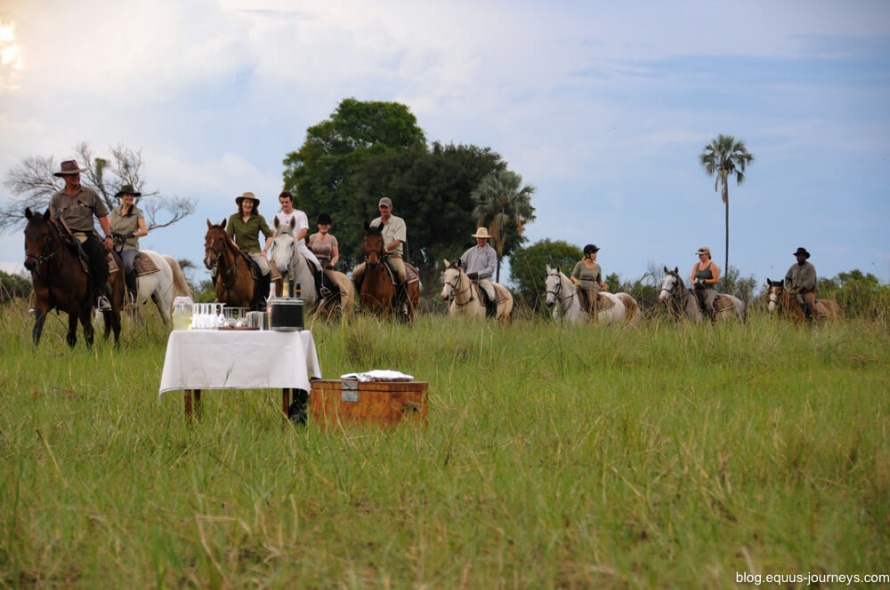 Riding out to your sundowners spot in Botswana