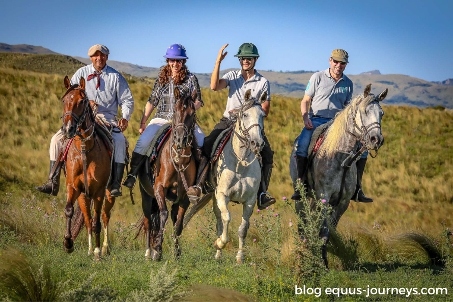Group of riders riding in field in Argentina