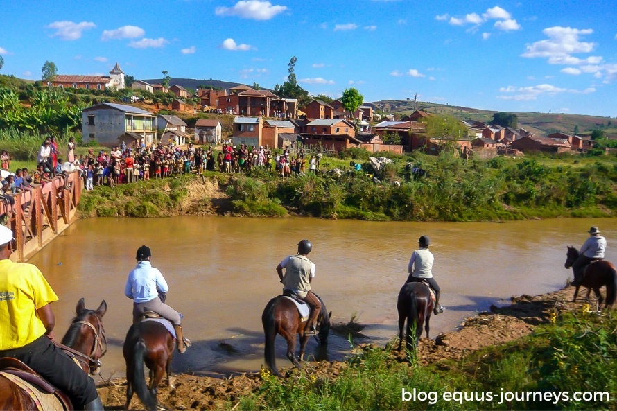 Locals gathering to watch the riders in Madagascar